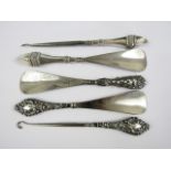 Edwardian and later silver handled button hooks and shoe horns (5)