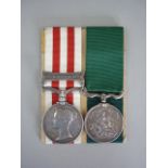 An Indian Mutiny Medal with Lucknow clasp, together with a Northumberland Fusiliers Silver Medal