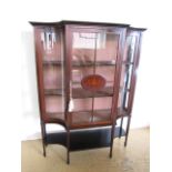 An Edwardian Sheraton revival inlaid mahogany display cabinet, having a moulded cornice with