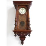 A large late 19th / early 20th Century Vienna wall clock, having a spring driven two-train