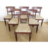 A set of six William IV mahogany dining chairs, each having scroll tablet back and mid-back rail