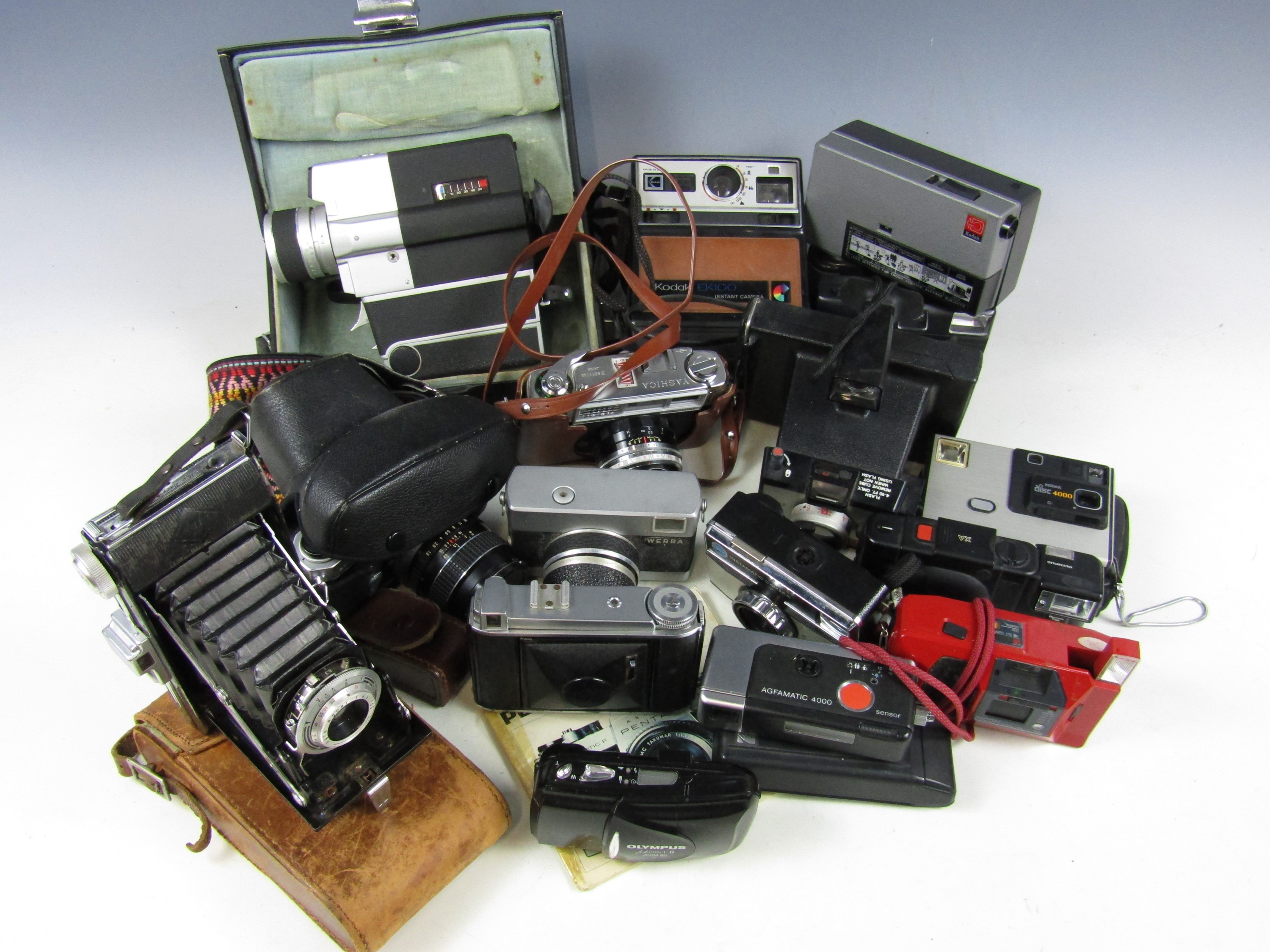 A quantity of cameras including a Kodak 155x instamatic, Kodak Retinette, Sanyo cine camera Cm400,