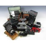 A quantity of cameras including a Kodak 155x instamatic, Kodak Retinette, Sanyo cine camera Cm400,