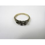 A Victorian four stone diamond ring (a/f), having three old cut stones each of approximately 0.10ct,