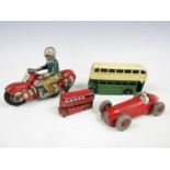 A Schuco tinplate motorcycle and rider, together with various Dinky Toys etc.