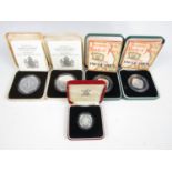 Five GB Royal Mint silver proof commemorative coins, including two Queen Elizabeth the Queen