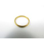 A 22ct gold wedding band, 2.1g