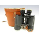 A cased pair of Boots 10 x 50 binoculars