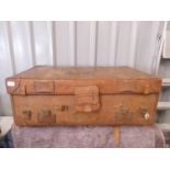 A large 1940's brown leather luggage case