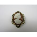 A Victorian shell cameo brooch, carved in depiction of a young Grecian girl, in a rolled gold mount