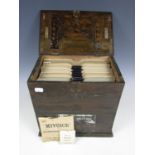 A wooden case of 78 rpm records, together with MiVoice record needles and a record