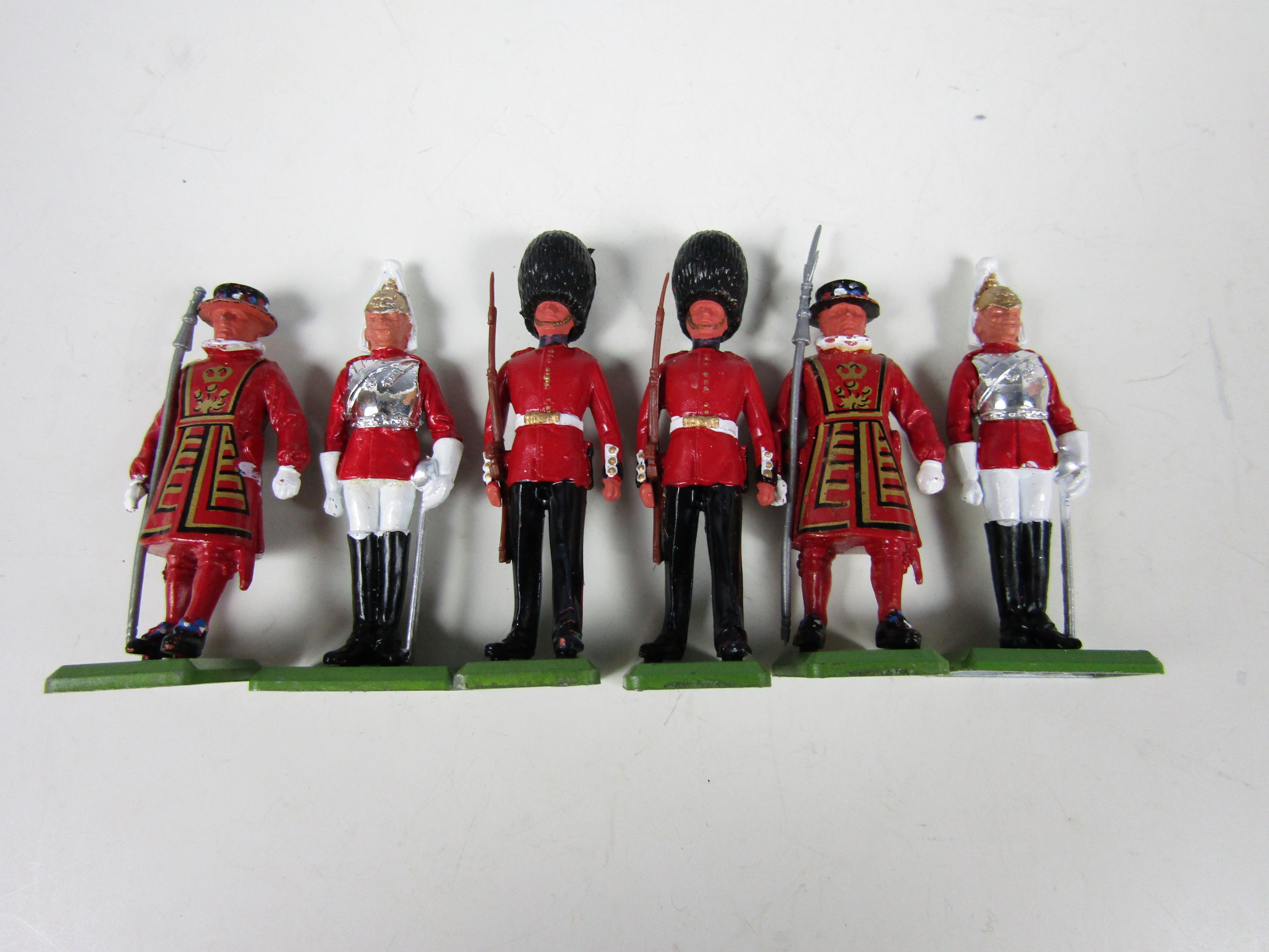 Six 1970's Britains die-cast soldiers including guards and Beefeaters