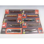 Ten boxed Lima railway carriages