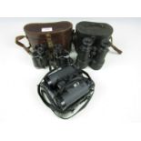 Three pairs of vintage binoculars