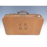 A vintage initialed suitcase