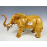 A boxed African Plains elephant figurine
