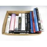 A box of military books including The Last Assault and Colditz etc.