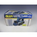 A boxed Powercraft electric planer