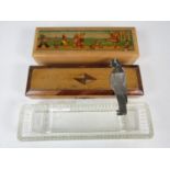 Two vintage pencil boxes together with a pen tray and a Winston Churchill bookmark