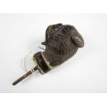 A novelty wooden hounds head walking stick pommel