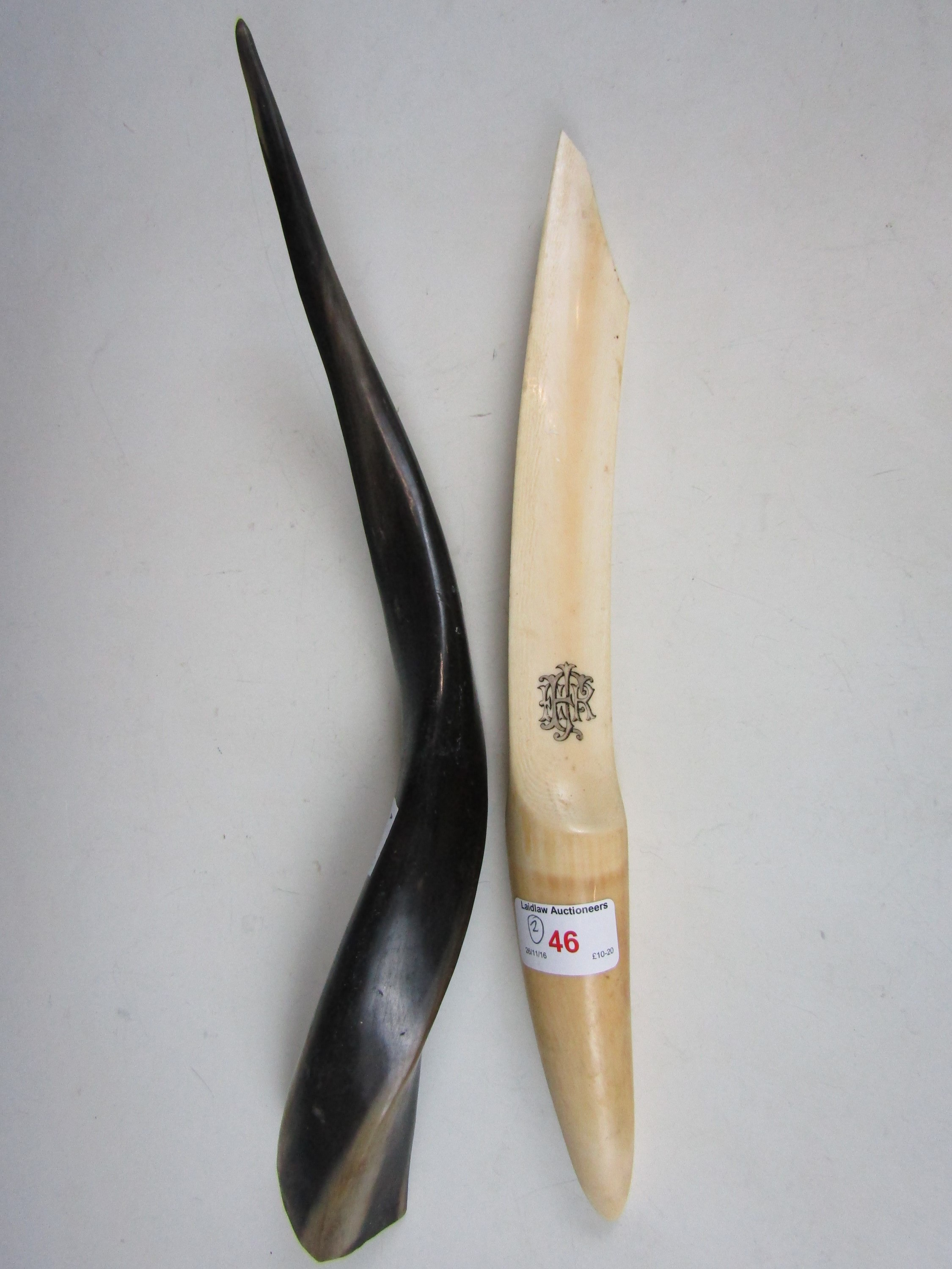 A Victorian ivory paperknife (a/f) together with an African horn oliphant