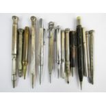 Fourteen vintage base-metal and celluloid propelling pencils