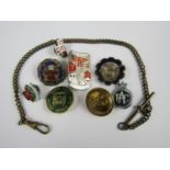 A collection of various enamelled badges and buttons, including an enamelled silver Trade Union