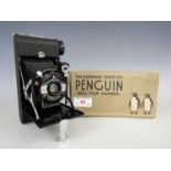 A boxed Kershaw Eight-20 Penguin roll film camera