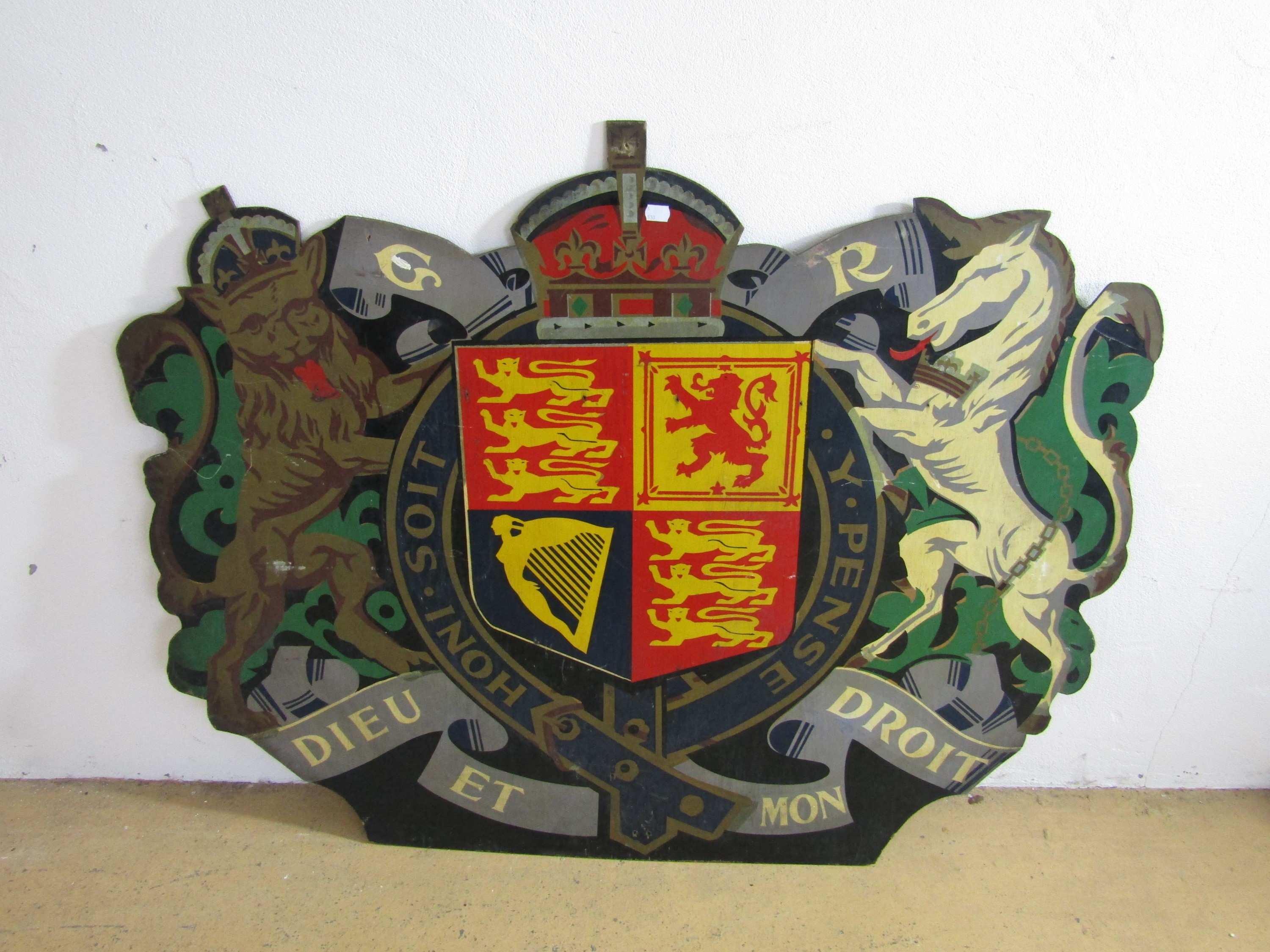 A large 1940s Royal coat of arms screen-printed on plywood, 91 cm high