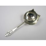 A George VI silver tea strainer, Viner's Ltd, Sheffield, 1937, 33g