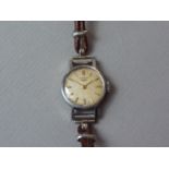 A 1960s lady's Longines stainless steel wristlet watch, with calibre 13.15V movement