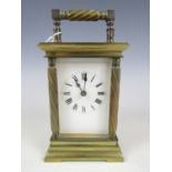 A late 19th / early 20th Centry French carriage clock, the case having spirally fluted columns and