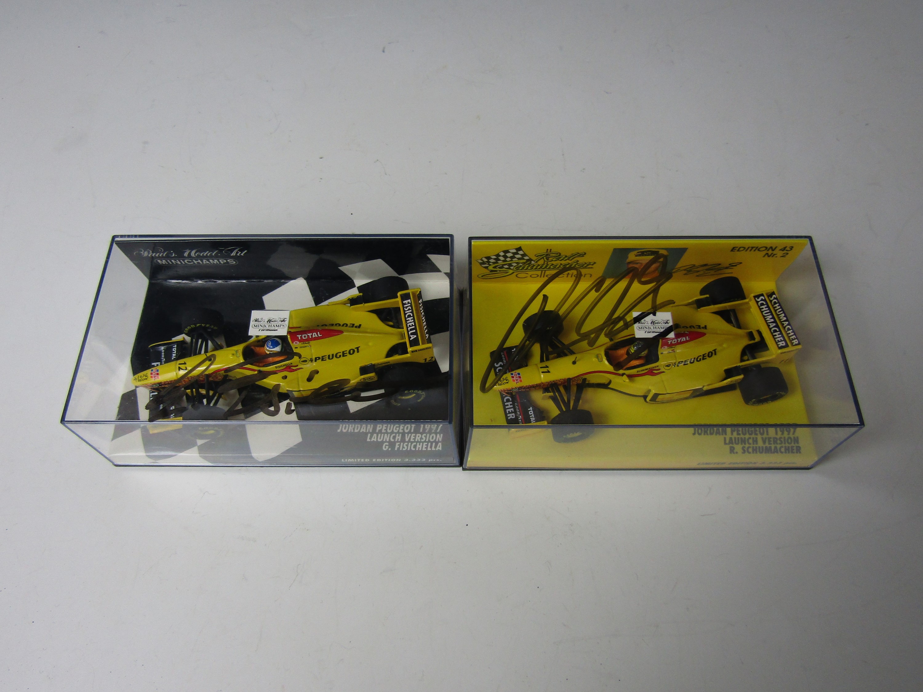 Two Paul's Model Art Minichamps die-cast Formula 1 Jordan 1997 racing cars, respectively signed by