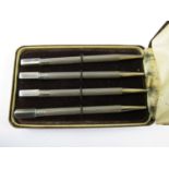 A cased set of sterling silver propelling Bridge pencils