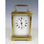 A 20th Century French carriage clock, 11 cm excluding handle