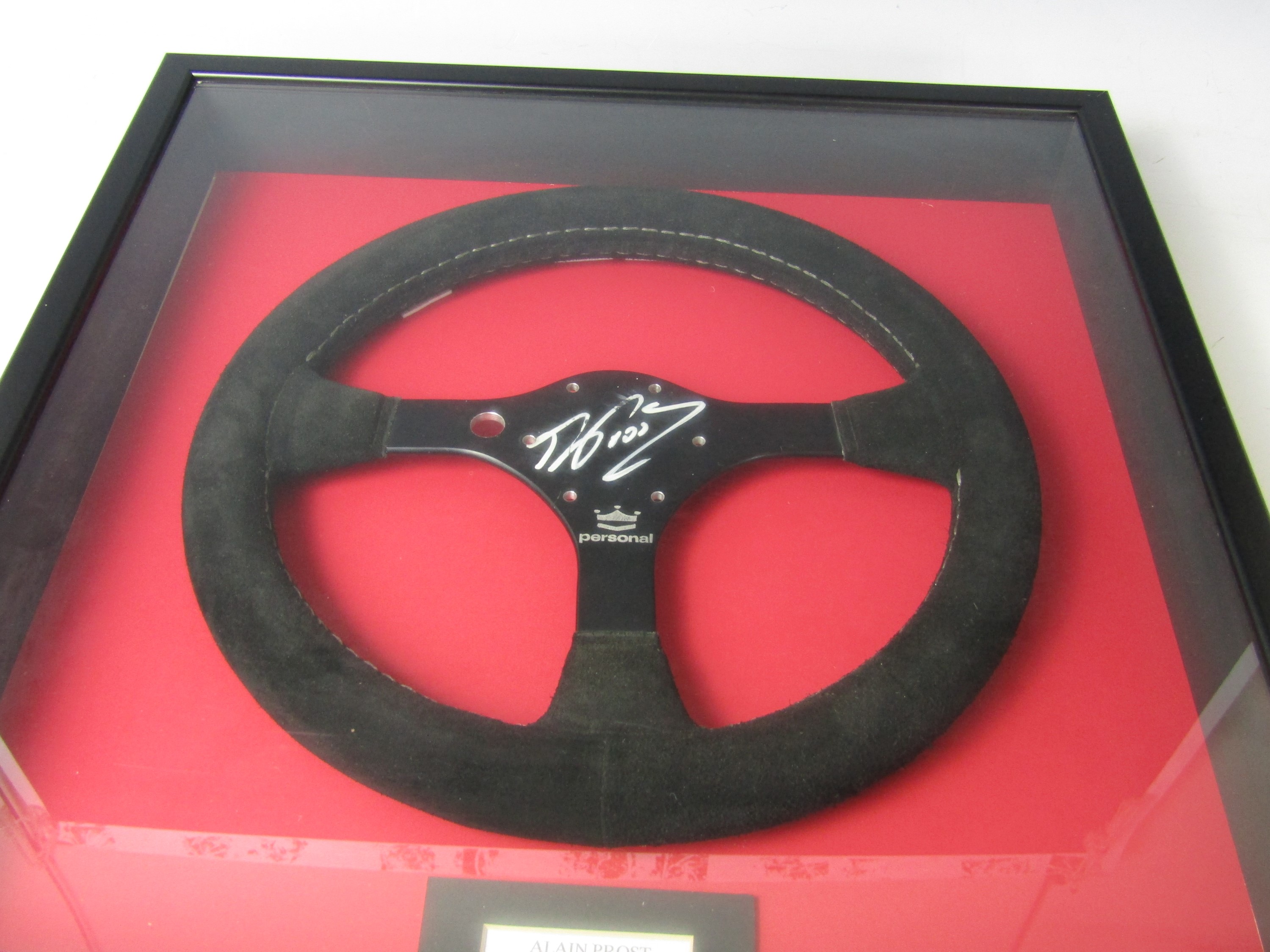 A framed replica Formula 1 steering wheel signed by Alain Prost - Image 3 of 3