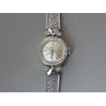 A 1960s lady's Certina diamond-set 9ct gold dress watch, having calibre 13-20 17-jewel movement with