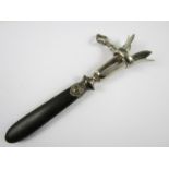 A late 19th / early 20th Century ebony and electroplate manche-a-gigot leg of lamb holder, 20.5 cm