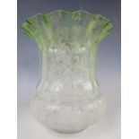 A late Victorian achromatizing green and acid etched glass oil lamp shade, incorporating stylized