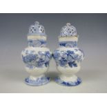 A pair of earthenware blue and white transfer printed pepperettes, second quarter 19th Century, 11.5