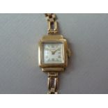 A 1950s lady's Rotary 9ct gold wristlet watch, with 9ct gold bracelet strap, 9.3 g weighable gold