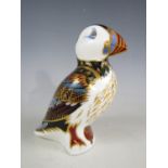 A Royal Crown Derby bone china Puffin paperweight, with gold stopper, 12 cm