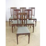 Six Gillow of Lancaster oak meeting room chairs, four bearing numbered ivorine plaques, variously