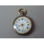 A Victorian lady's silver fob watch, having pin-set movement, enamelled face with gilt