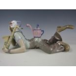 A Lladro porcelain figurine Seeds of Laughter sculpted by Salvador Furio, No. 5764, 12 x 30 cm