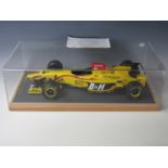 A cased Amalgam Models for Motorsport scale model of the Jordan 197 1997 Formula 1 racing car driven