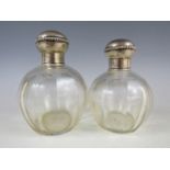 A pair of late 19th / early 20th Century cut glass and silver mounted grenade-form perfume