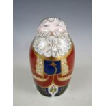 A boxed Royal Crown Derby bone china Santa Claus paperweight, with gold stopper, signed and dated by