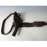 A Sam Browne belt and holster