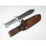 A Second World War French Fascist Youth dagger, having cast alloy hilt with checkered grips, and